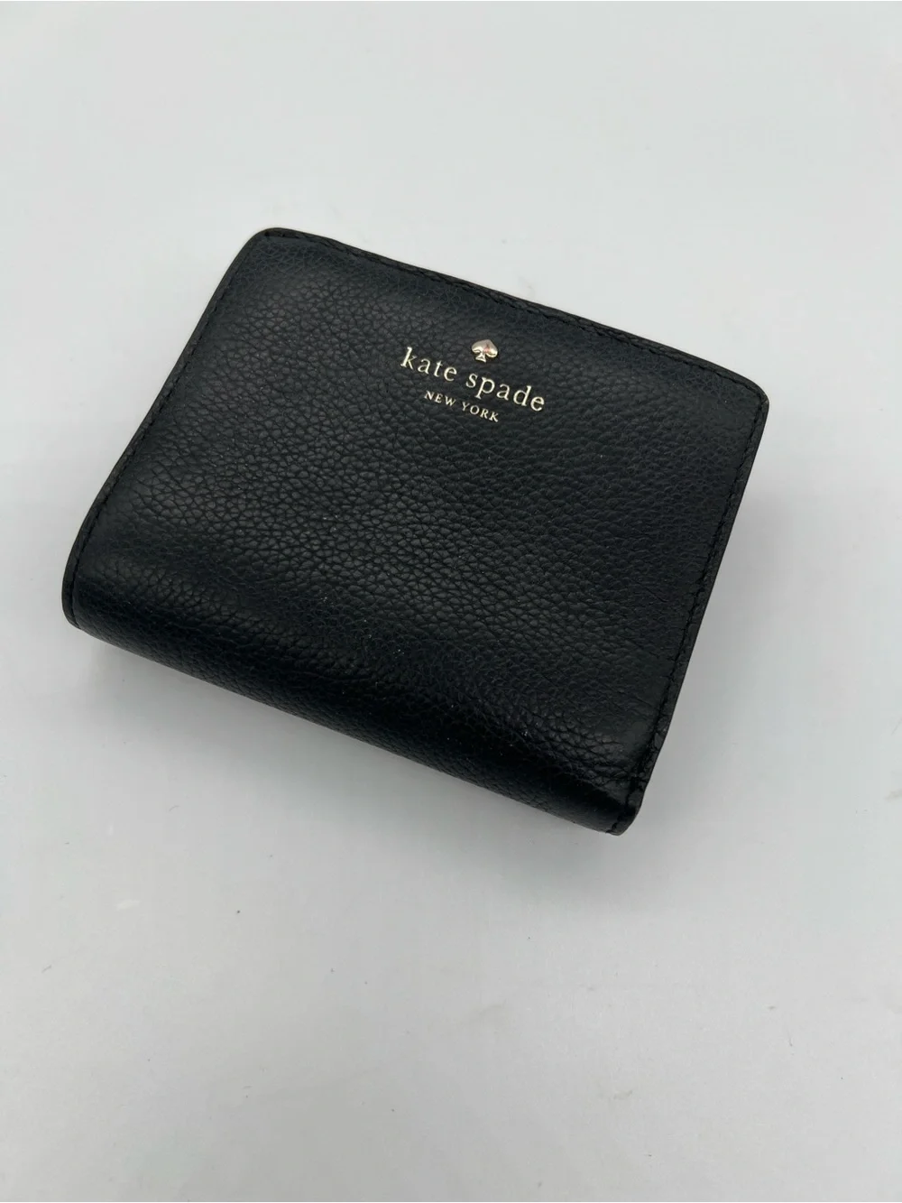 kate spade Black Pebbled Leather Zip Wallet with Gold Logo